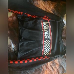 vans cropped black and red, with vans logo on the front and design on the sleeve